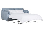 Blue sofa bed with whitewashed oak legs