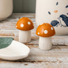 lifestyle image of matching woodland salt and pepper shakers 