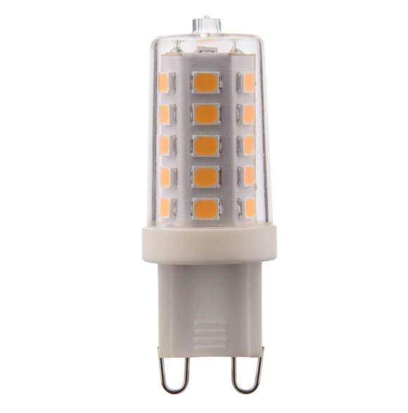 Energy-efficient LED G9 light bulb illuminating a room with soft white light.