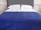 Plush bed throw in navy