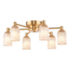 Hilaria six light flush ceiling light in antique gold with amber ribbed glass