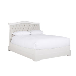 The Mabel King Size Bed in Bone, featuring a beautifully upholstered headboard that exudes elegance and sophistication. The bone color adds a touch of luxury to the bedroom, while the generous size of the bed provides ample space for a comfortable night's sleep.