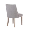 A semi-side view of the chair's back, highlighting its stylish silhouette and quality craftsmanship.