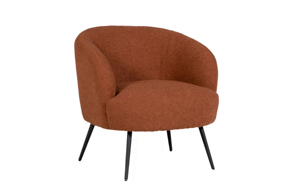 Add a pop of warmth and sophistication to your living space with the Shelbie Accent Chair in Rust. The rich rust-colored upholstery brings a touch of boldness and depth to any room. The chair's curved backrest and sleek design offer both comfort and style, making it a standout piece in your home decor. Whether placed in a cozy reading nook or used as a statement chair in your living room, the Shelbie Accent Chair in Rust is sure to make a lasting impression.