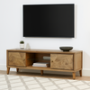 Wooden TV stand with a television mounted on a white wall in a living room.
