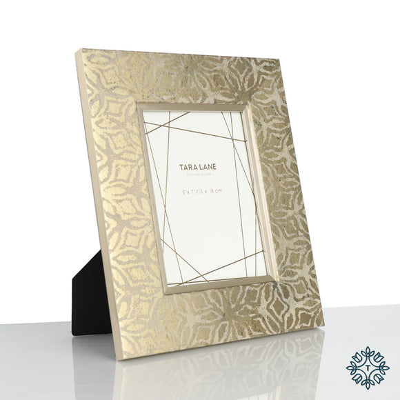 Capture the beauty of your cherished moments in the Thorley Photo Frame 5x7, an exquisite frame that brings your memories to life with elegance and style