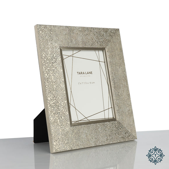 Capture the essence of your cherished moments with the Fenton Photo Frame 5x7, a stylish and timeless frame that beautifully showcases your 5x7 photos.