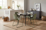 Yara black round dining table shown from above (2)