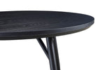 Yara black round dining table shown from above (6)