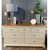 The Claire Wide Chest features a spacious design with seven drawers, providing ample storage space for your belongings. Its sleek and contemporary look enhances any bedroom decor.
