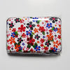 The Floral Credit Card Holder Assortment combines practicality and aesthetics in one delightful package. Each card holder in this assortment features a charming floral design that brings a touch of nature to your everyday life. Compact and lightweight, these holders fit easily into your purse or pocket, allowing you to carry your essential cards with ease. Stay organized and stylish with this assortment of floral credit card holders, and never compromise on functionality or beauty.