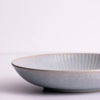 Mason Cash Reactive Linear 23cm Grey Pasta Bowl on kitchen table