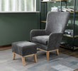 Dark grey occasional chair with footstool