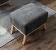 Dark grey chair + footstool for relaxation