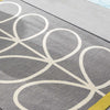 Discover the allure of Orla Kiely rugs – perfect for any outdoor setting.
