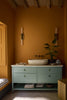 Ashes of Marigold No.350 by Little Greene, room setting with Perpetual Blue No.348 and Vulcan No.324