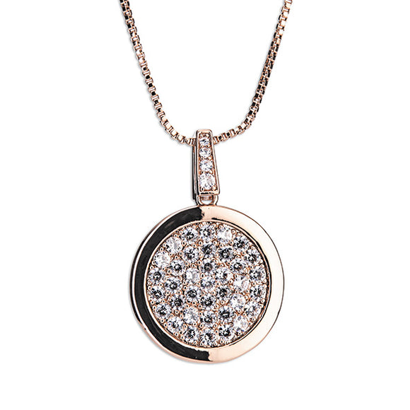 A mesmerizing image of the Newgrange Rose Gold Round Diamante Pendant, a captivating piece that combines the warm glow of rose gold with sparkling diamantes, exuding sophistication and grace.