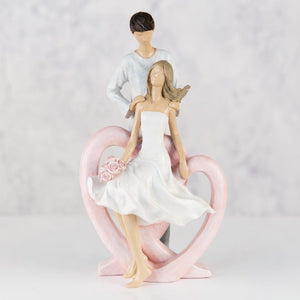 Figurine  Man Holding Lady with Flowers