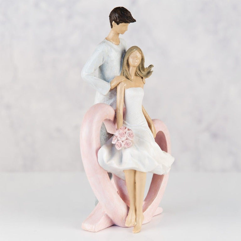 Figurine  Man Holding Lady with Flowers