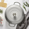 A visual representation of the Cast Iron Casserole Graduated Grey 26cm, showcasing its stylish graduated grey finish and secure-fitting lid for exceptional cooking.