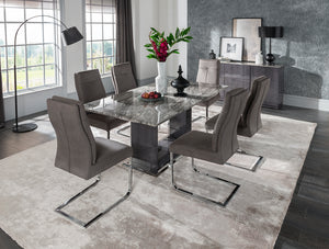 A lifestyle image featuring the Donatella Dining Table 2200mm in a beautifully decorated dining room, illustrating its ability to create a luxurious and inviting atmosphere. The 2200mm size allows for versatile seating arrangements, making it perfect for hosting memorable gatherings and special occasions.