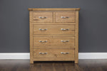 Narrow oak chest of drawers

